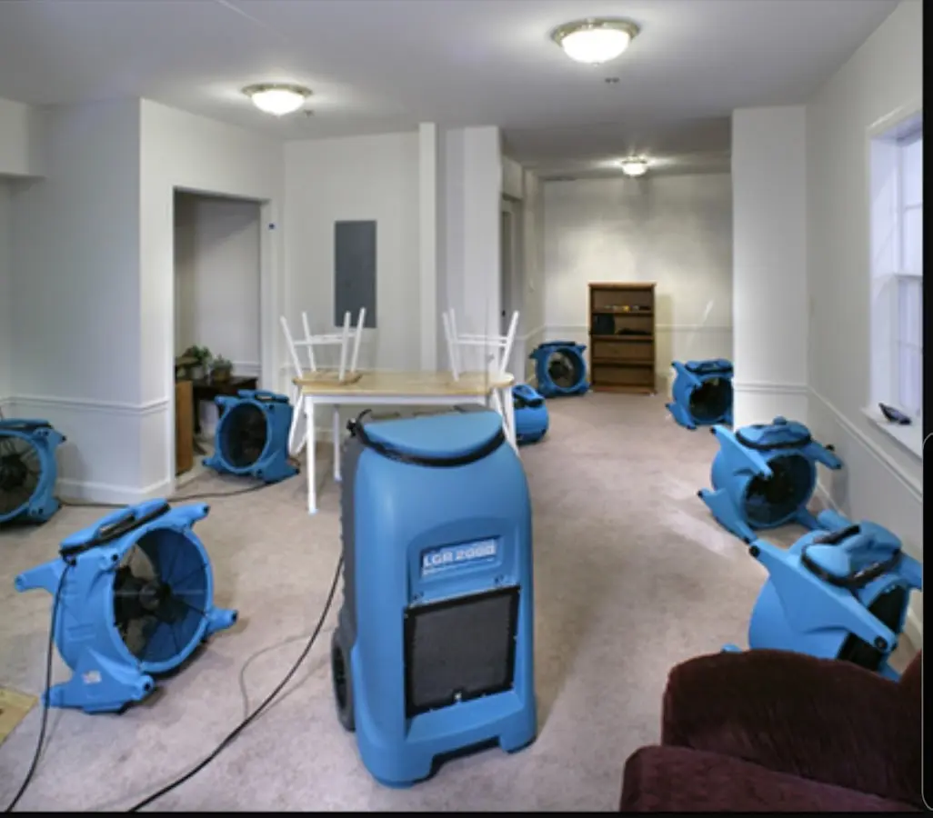 Air movers and dehumidifier setup for Water Extraction & Removal in Laramie